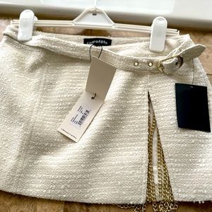 Retrofete mini skirt. With tag